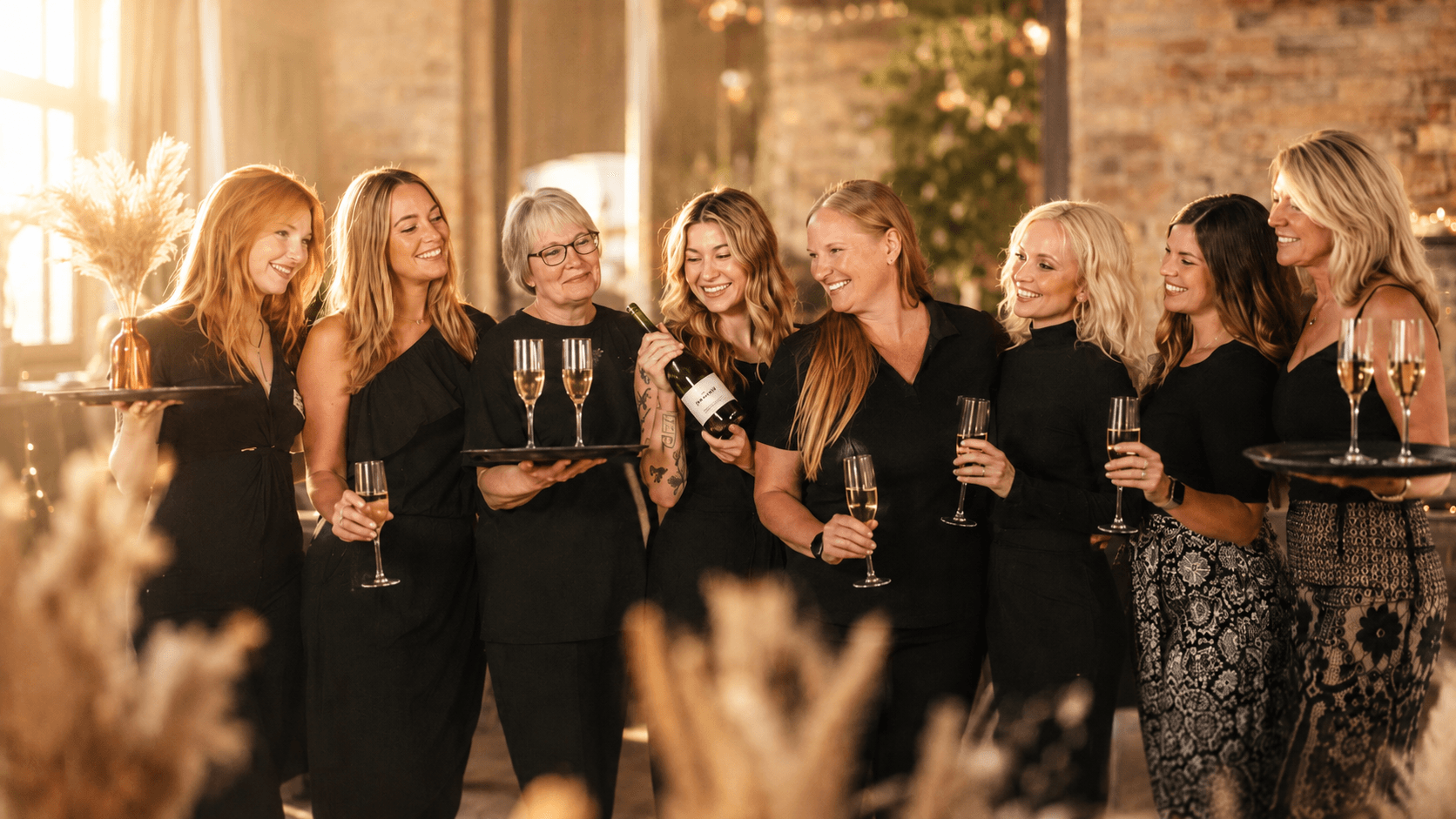 The Spunky Spirits team of bartenders and Party Pals™ with champagne
